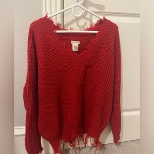 Red distressed sweater